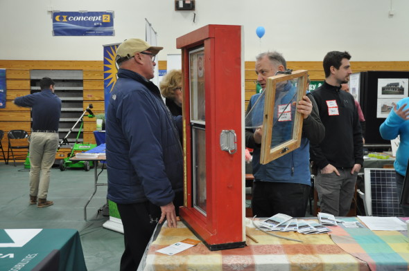 Chris Pratt and Troy Borland demonstrating Open Sash window system to attendees of LEAP Energy Fair.
